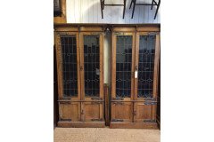 A pair of Arts & Crafts Oak glazed bookcases over a lower cupboard - Thumbnail 7