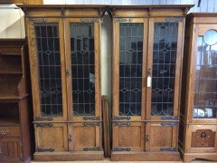 A pair of Arts & Crafts Oak glazed bookcases over a lower cupboard - Thumbnail 8