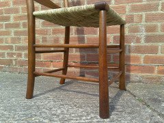 C. R. Ashbee for Guild of Handicraft. A beech ladderback Armchair with a re-rushed seat - Thumbnail 36