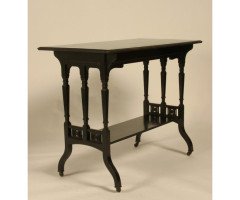 An ebonised oblong sidetable with subtle carved details - Thumbnail 1