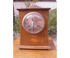Liberty & Co. An Arts & Crafts Oak mantle clock In the style of C. F. A Voysey - Thumbnail 1